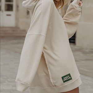 Daily drills white hoodie sweatshirt/dress. Size XS/S, brand new without tags